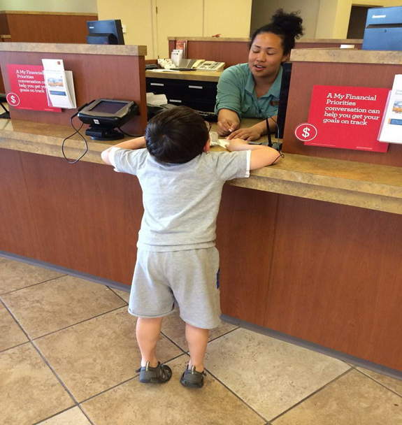 Image of a Boy at a Bank