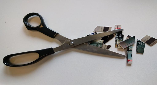 Image of Scissors Cutting Credit Cards into Shreds