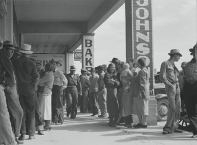 Families in Calipatria, California, waiting in line for relief checks